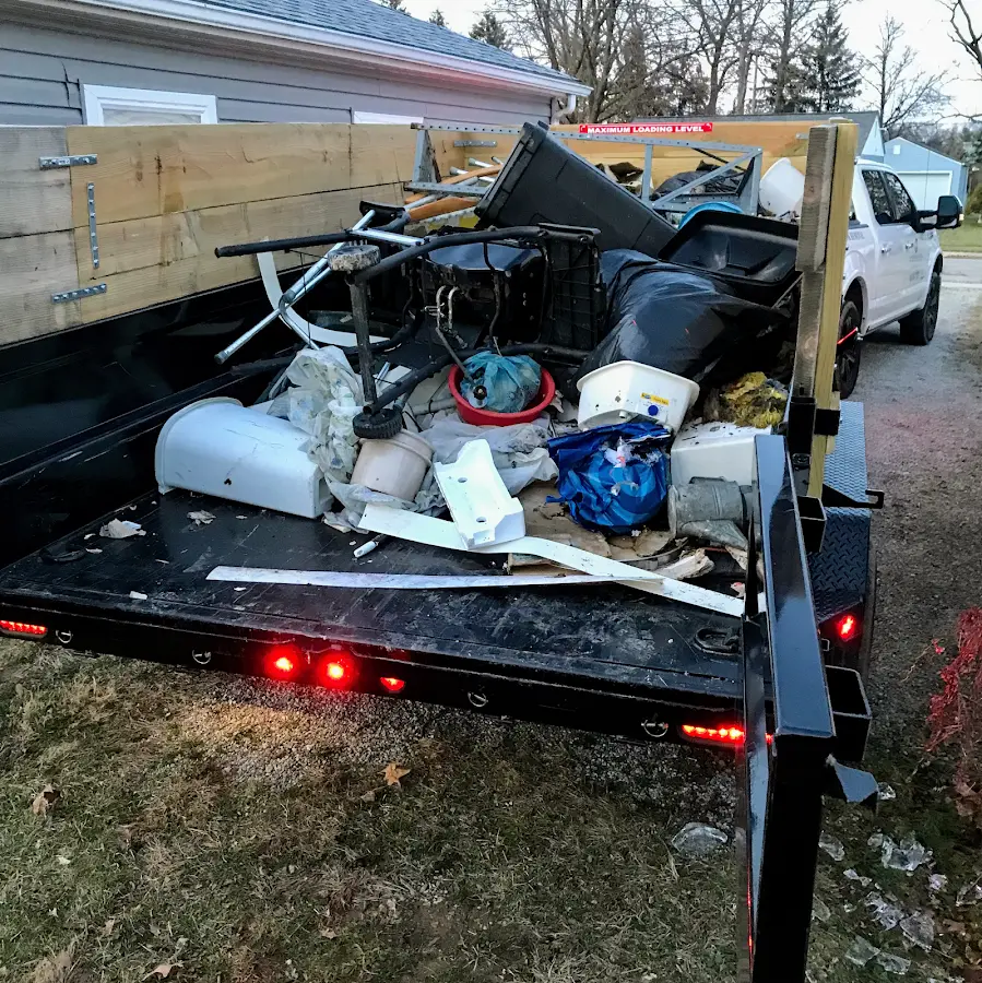 Roll-off dumpster delivered to a residential driveway in Coe