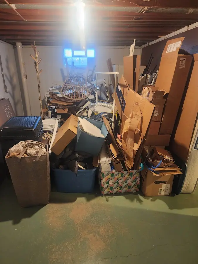 Roll-off dumpster container at job site for 4 Yard Dumpster Rental in Coe